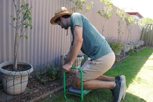 Gardener Using a Gardening Stool 